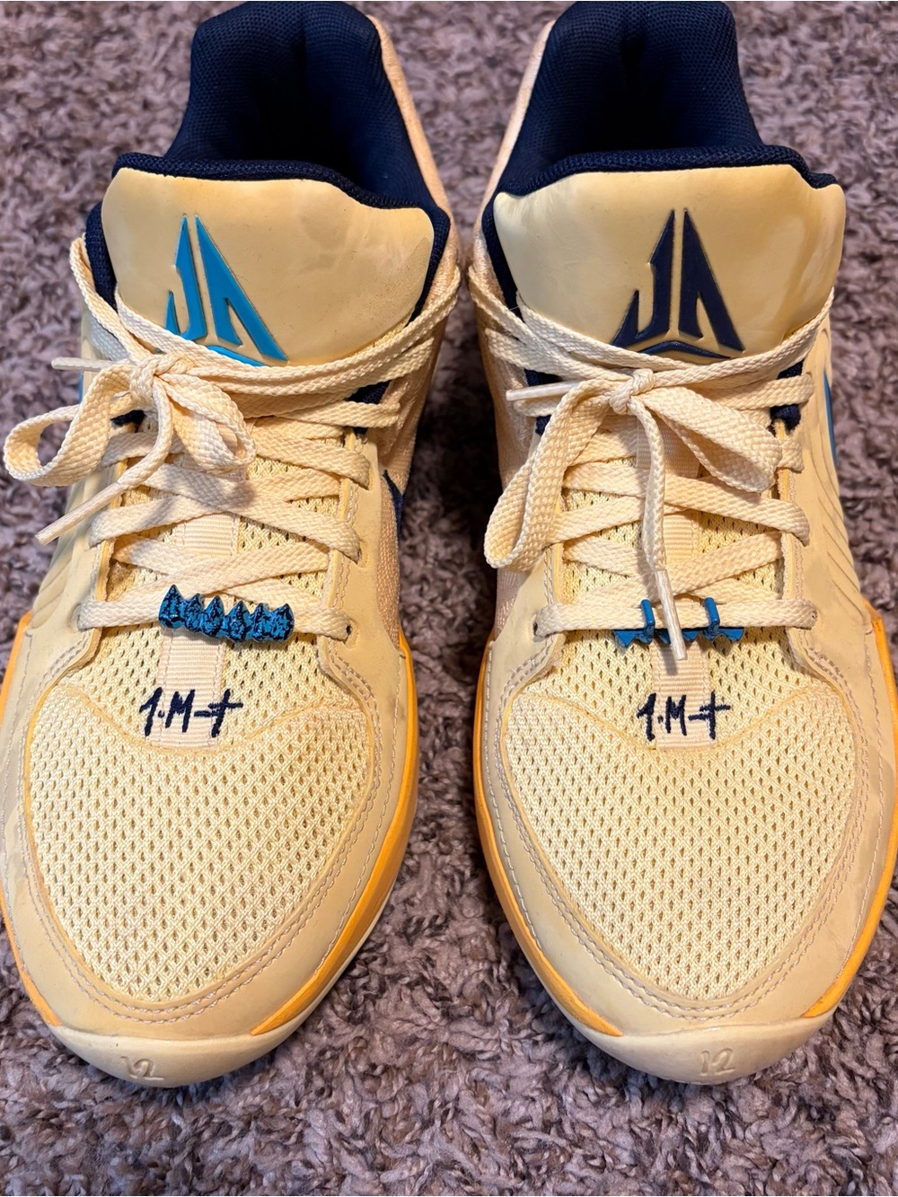 Nike Yellow Athletic Shoes with Navy and Blue Accents